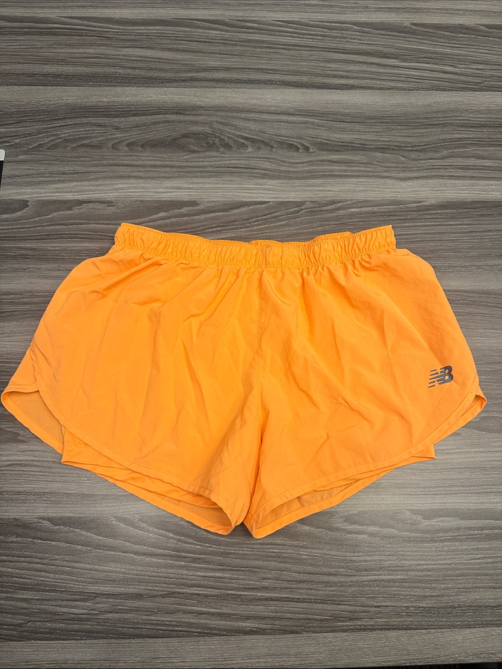 New Balance Women’s Vibrant Orange Athletic Shorts